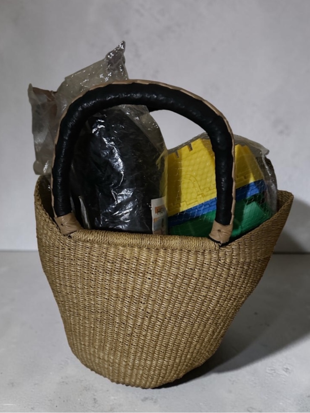 Filled Woven Straw Tote with Black Wrapped Handles